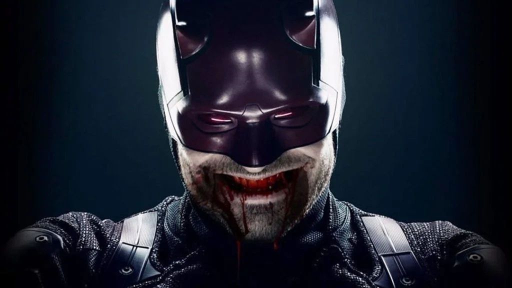 Charlie Cox as Daredevil with a creepy Joker-like smile in Marvel's The Defenders